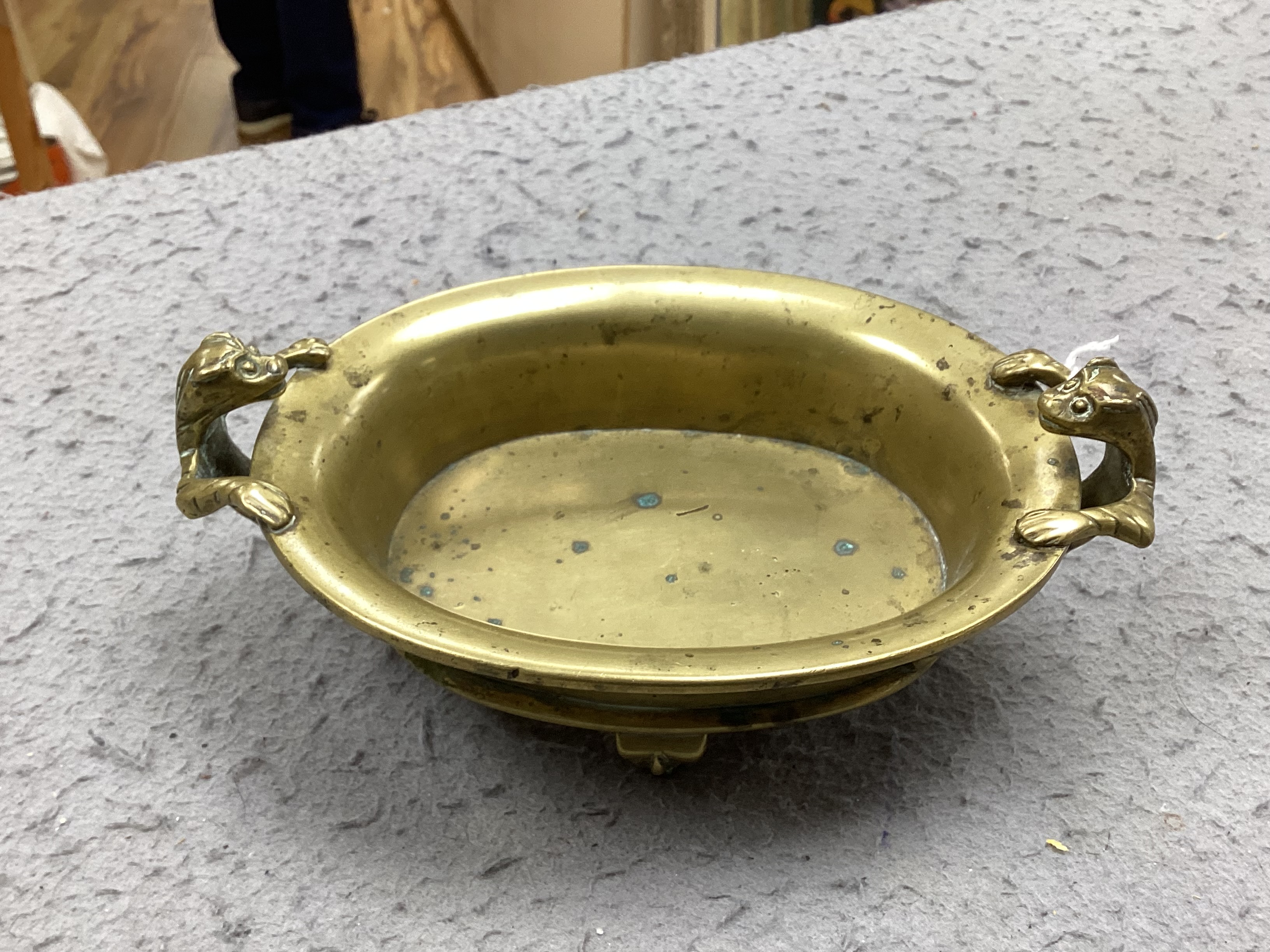 A Chinese archaistic bronze censer, Qing dynasty, a mirror and various Asian bronzes etc, censer 19cm wide